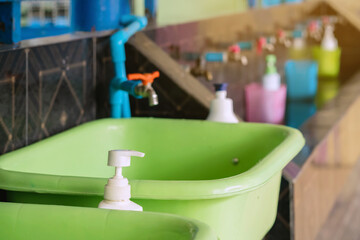 Hand washing area for cleaning to prevent the spreading of the Corona virus (Covid-19) for students before class in school. Health Care concept. New normal education. Selective focus