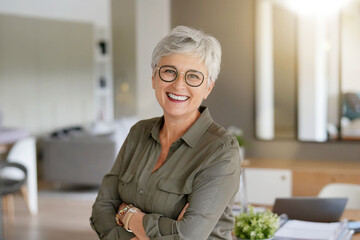 portrait of a beautiful smiling 55 year old woman with white hair - 384171595