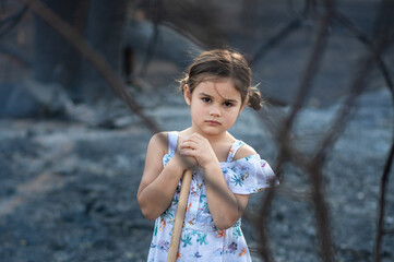 Girl planting tree after tire