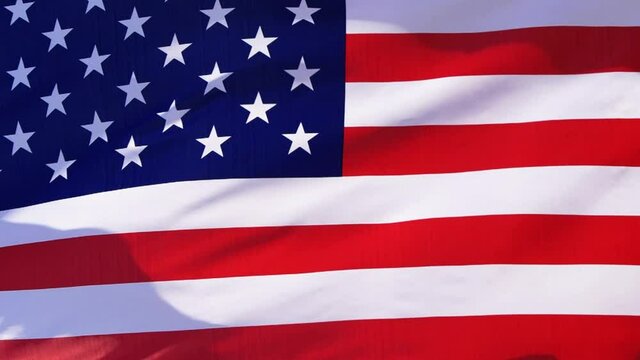 Slow motion of Unated States American flag waving in the wind video, USA symbol