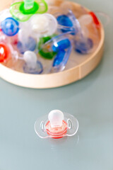Multicolored plastic pacifier