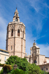 Fototapeta premium Micalet and iron gate of Valencia Cathedral from Virgin square