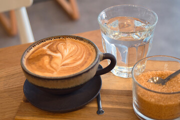 Coffee break - a cup of delicious fresh cappuccino