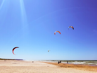 kitesurf athlete rides the waves of the Baltic Sea