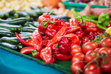 Large heap of fresh ripe organic pepper on farmer market in Paris