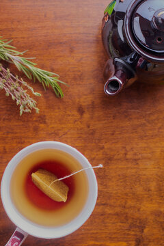 Top Down View Of Herbal Tea And Tea Pot.