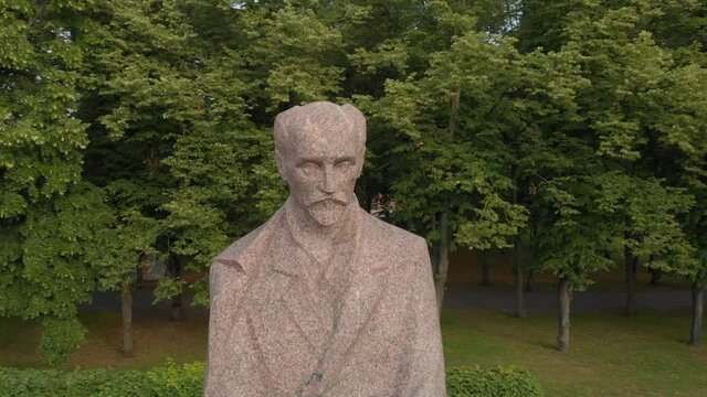 Close up of Rainis sculpture in Esplenade park in Riga, Latvia, day, circle shot
