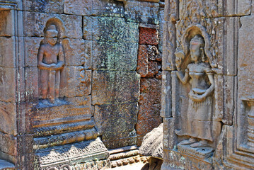 Ancient bas-reliefs at Ta Som temple in Angkor, Cambodia