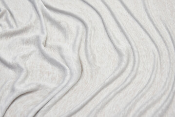 Fototapeta na wymiar Jersey fabric white fabric texture with textile patterns fiber cloth texture. This jersey texture is stretchy and elastic.