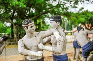 The semen boxing action figures at Wat Bang Kung Temple in Samut Songkhram province Thailand 