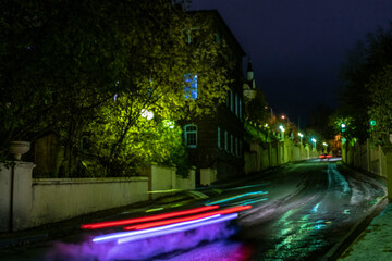 Long exposure night city car driving 