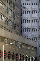 Residential area in old apartment with windows. High-rise building, skyscraper with windows of...