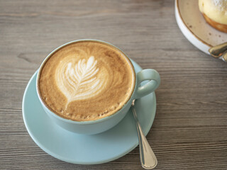 Hot cup of coffee on the table