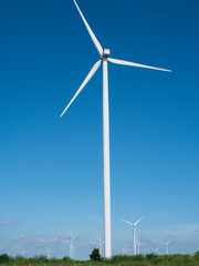 Renewable energy concept, Field of wind turbines generating electricity,Windmills and beautiful landscapes