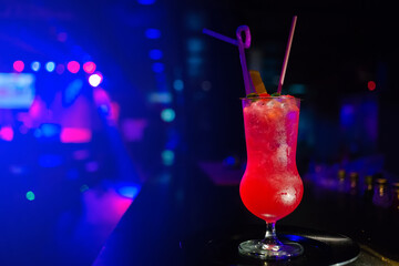 Red cocktail in a nightclub