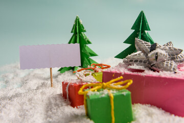 christmas presents nicely decorated with bows and feathers. view from above.