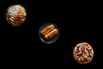 Fast Food isolated on a black background. Dishes of mouth-watering pastries.