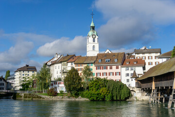 Fototapeta na wymiar view of the Aare river and the historic old town of Olten and wooden bridge