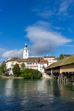 view of the Aare river and the historic old town of Olten and wooden bridge