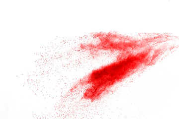 Launched red powder on white background.