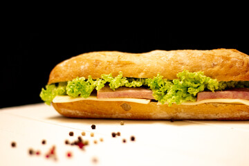 sandwich with ham and vegetables
