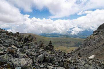 Cloudy skies and mountain ranges