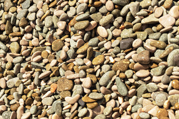 Natural background from colored and wet sea pebbles