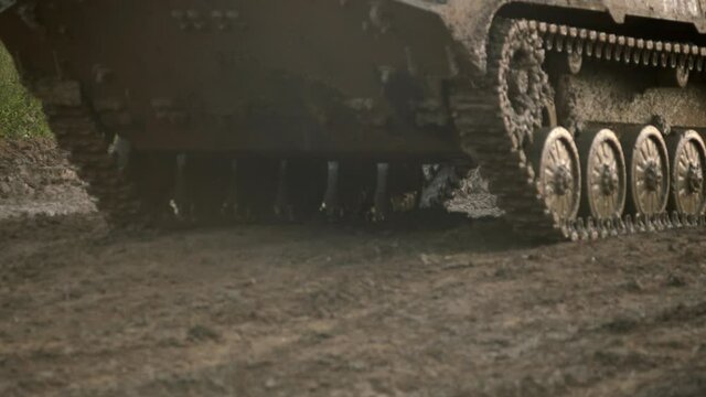 Tanks are moving to firing positions. Smoke bombs action. Battlefield. 