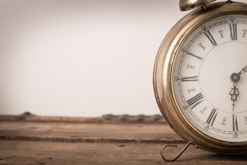 Vintage Metal Alarm Clock on Old Wooden Trunk, Room for Text