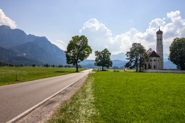 
church by the road on a sunny day in bavaria, germany