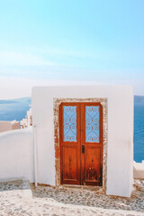 Door with sea view from oia santorini greece