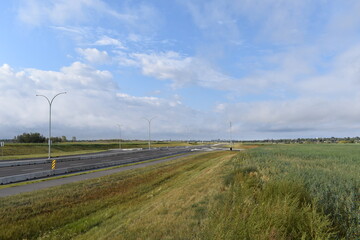 Open road under wide skies