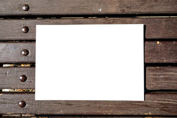 copy space horizontally on a wooden bench with metal rivets