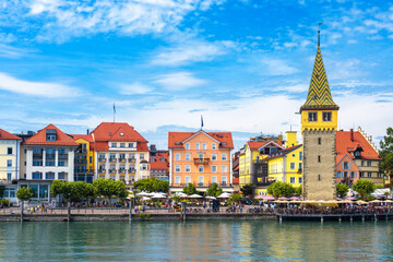 Lindau town in Bavaria, Germany. Colorful houses on coast of Lake Constance (Bodensee) in summer.