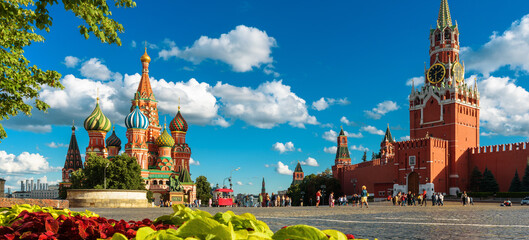 Red Square in summer, Moscow, Russia. Panoramic view of St Basil’s cathedral and Moscow Kremlin.