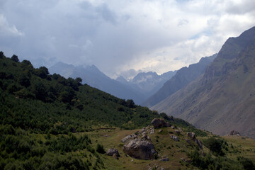 Fototapeta na wymiar Alpine landscape with mountain peaks and green valleys. Caucasus, Russia.