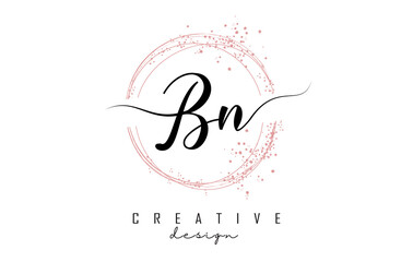 Handwritten BN B N letter logo with sparkling circles with pink glitter.