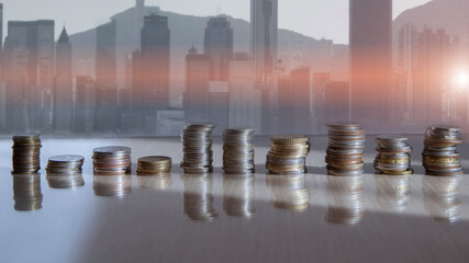 Coins on the background of the city.