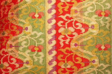More than 100 years old colorful thai handcraft peruvian style rug surface old vintage torn...