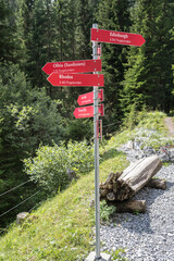 Red direction sign