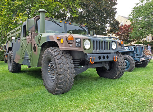 leeds, west yorkshire, united kingdom - 16 july 2019: a humvee pickup truck next to other military vehicles at the hebden bridge community annual vintage weekend