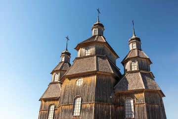 Wooden vintage church in Zaporozhian Sich medieval village, state of Cossacks on Khortytsia island,...