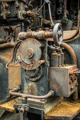 Fototapeta na wymiar rusty worm gear on an historic engine