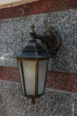 Old street lamp on the house