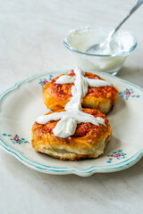 Turkish Traditional Food Borek Manti with Minced Meat, Tomato Paste and Yogurt / Yoghurt Burek Dumplings Sosyete Mantisi.