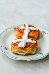 Turkish Traditional Food Borek Manti with Minced Meat, Tomato Paste and Yogurt / Yoghurt Burek Dumplings Sosyete Mantisi.