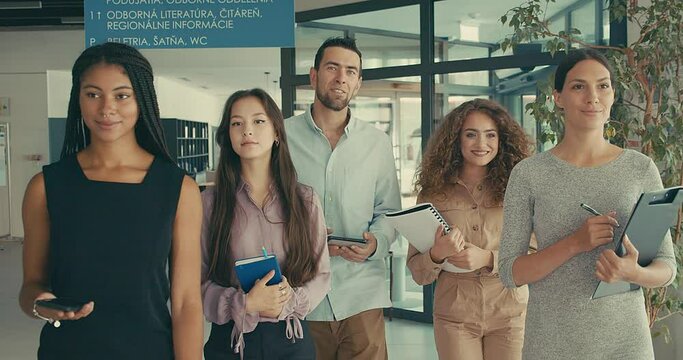 Group of young business people mixed race in modern work space. Creative team meeting. We are stronger together. 4k video Slow motion