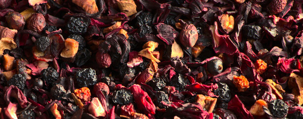 Hibiscus and berry tea, close-up. Hot fruit tea for breakfast. Anise and dried cherries in tea.