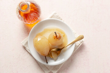 poached pear in a glass bowl