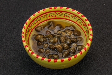 Tasty capers in the bowl